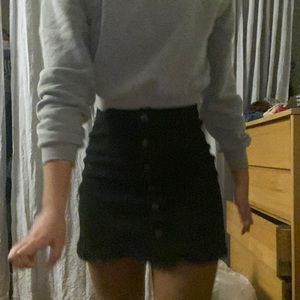 Black denim mini skirt